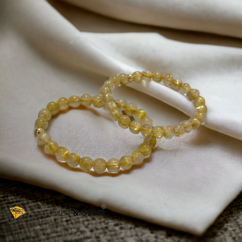 Golden Rutilated 7mm AAAA Grade Bracelet with 14k gold filled Bead