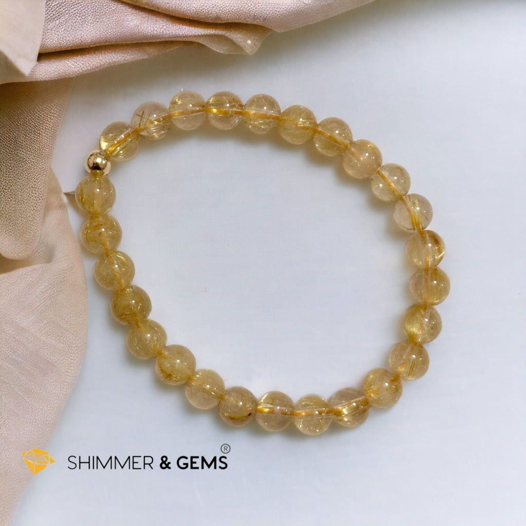 Golden Rutilated 7mm AAAA Grade Bracelet with 14k gold filled Bead