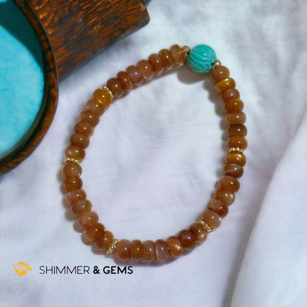 Golden Sunstone Rondelle with Lotus Turquoise Bracelet