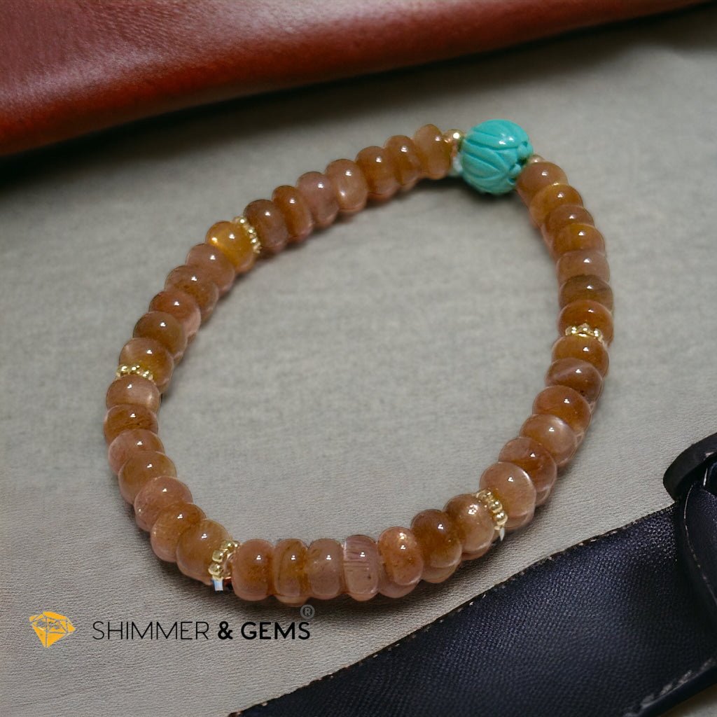 Golden Sunstone Rondelle with Lotus Turquoise Bracelet