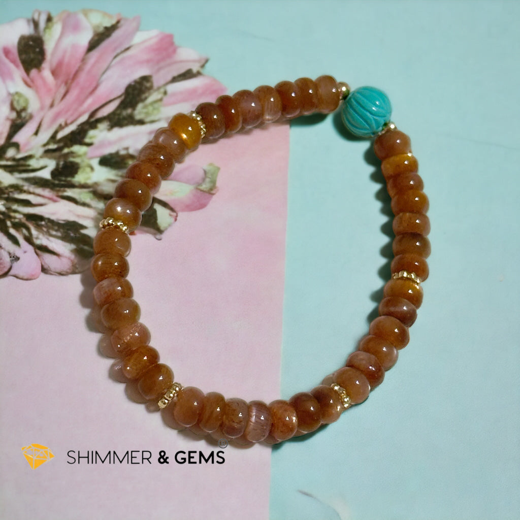 Golden Sunstone Rondelle with Lotus Turquoise Bracelet