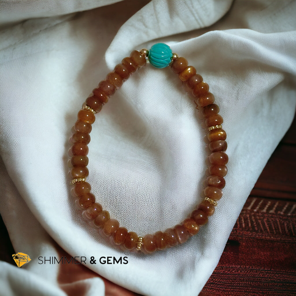 Golden Sunstone Rondelle with Lotus Turquoise Bracelet