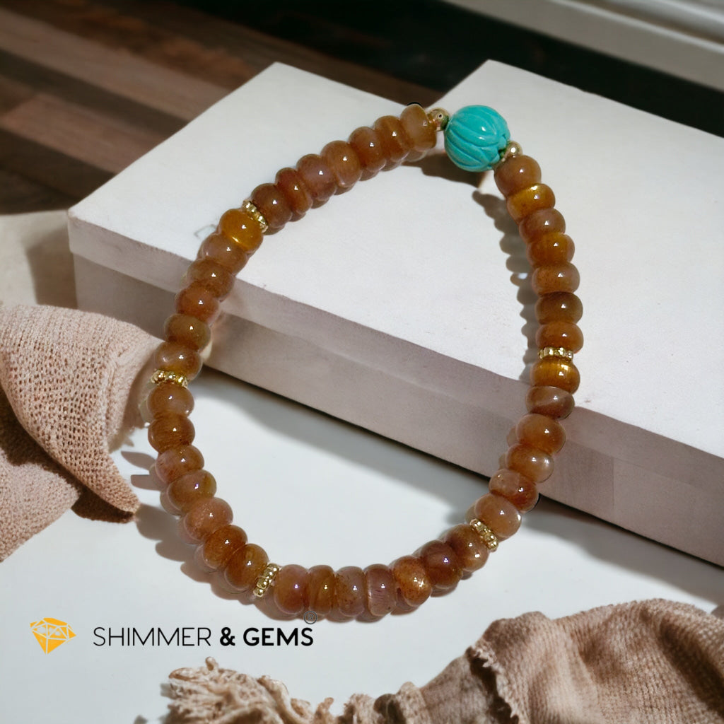 Golden Sunstone Rondelle with Lotus Turquoise Bracelet