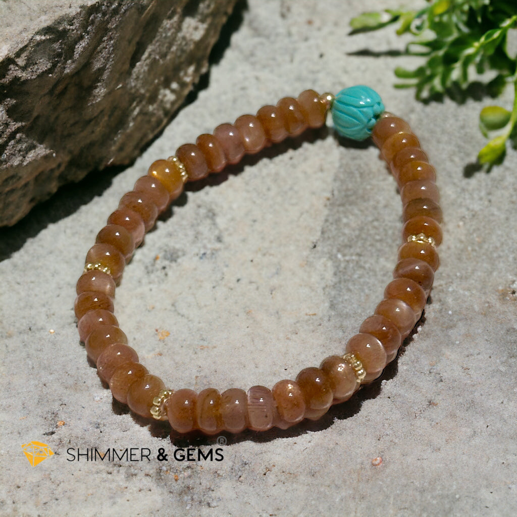 Golden Sunstone Rondelle with Lotus Turquoise Bracelet