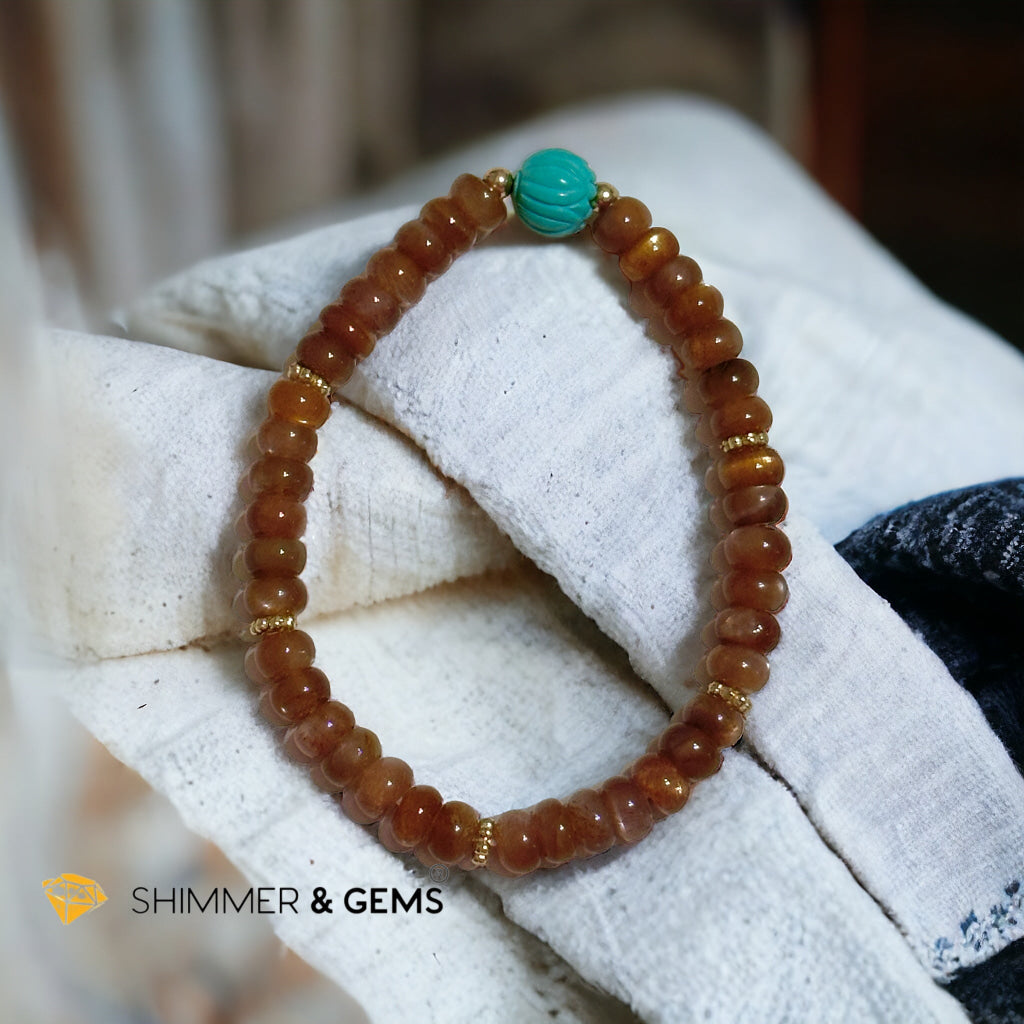 Golden Sunstone Rondelle with Lotus Turquoise Bracelet