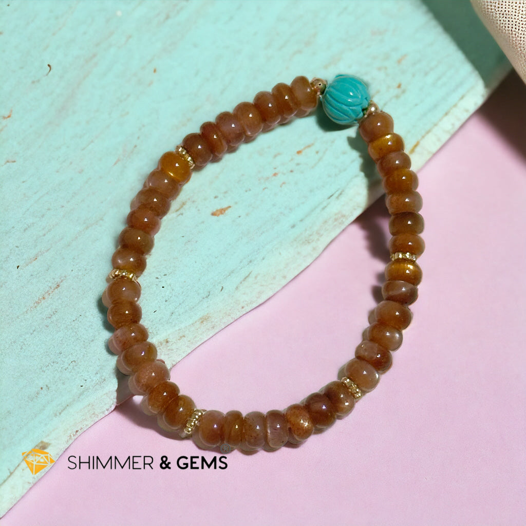 Golden Sunstone Rondelle with Lotus Turquoise Bracelet