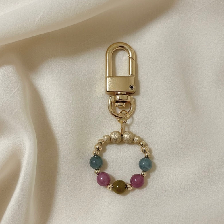 Macaron Tourmaline Stress Release Bag Charm in 14k Gold Filled by Audrey