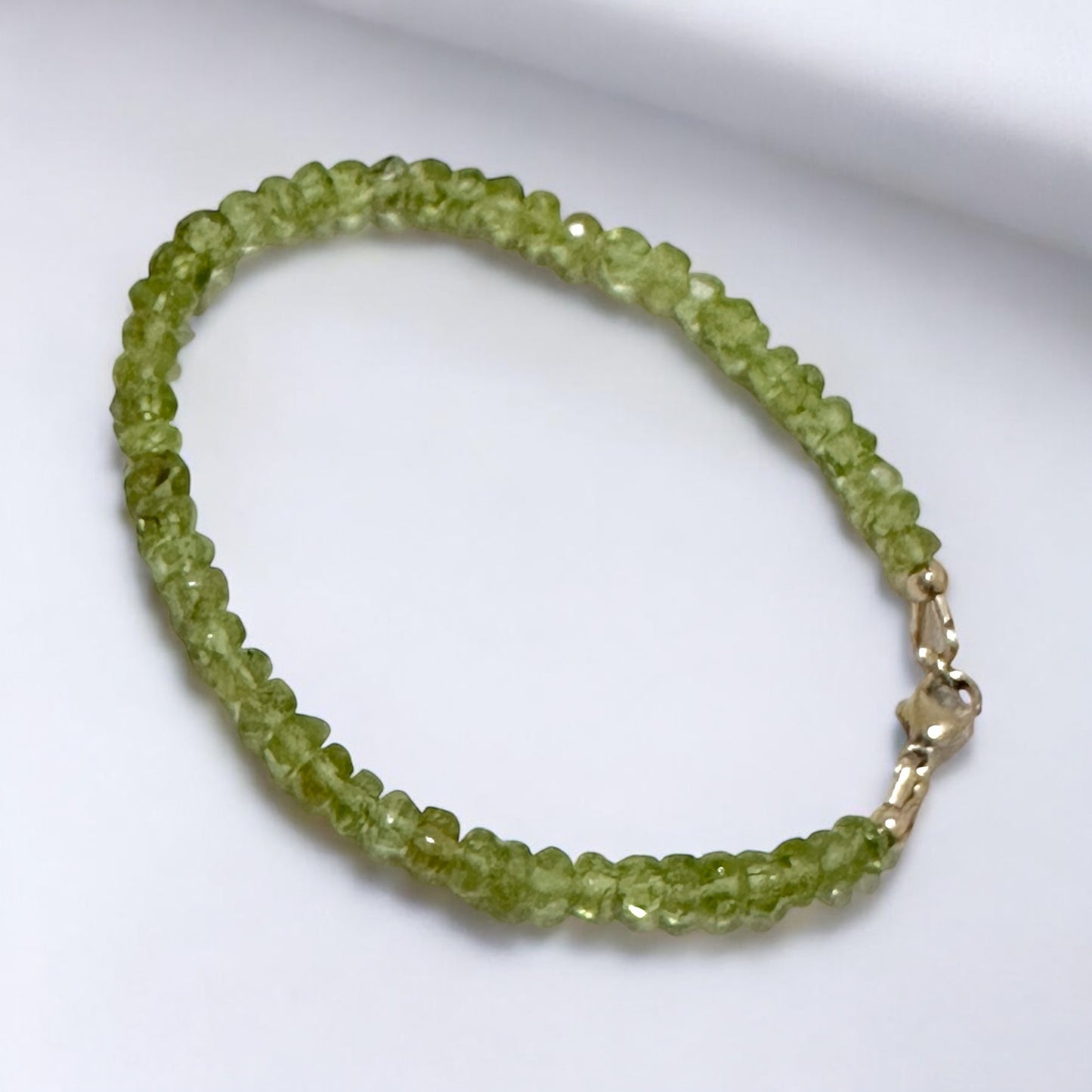 Peridot 3x5mm Rondelle Bracelet 14k gold filled clasp AAA Grade (Money Magnet)