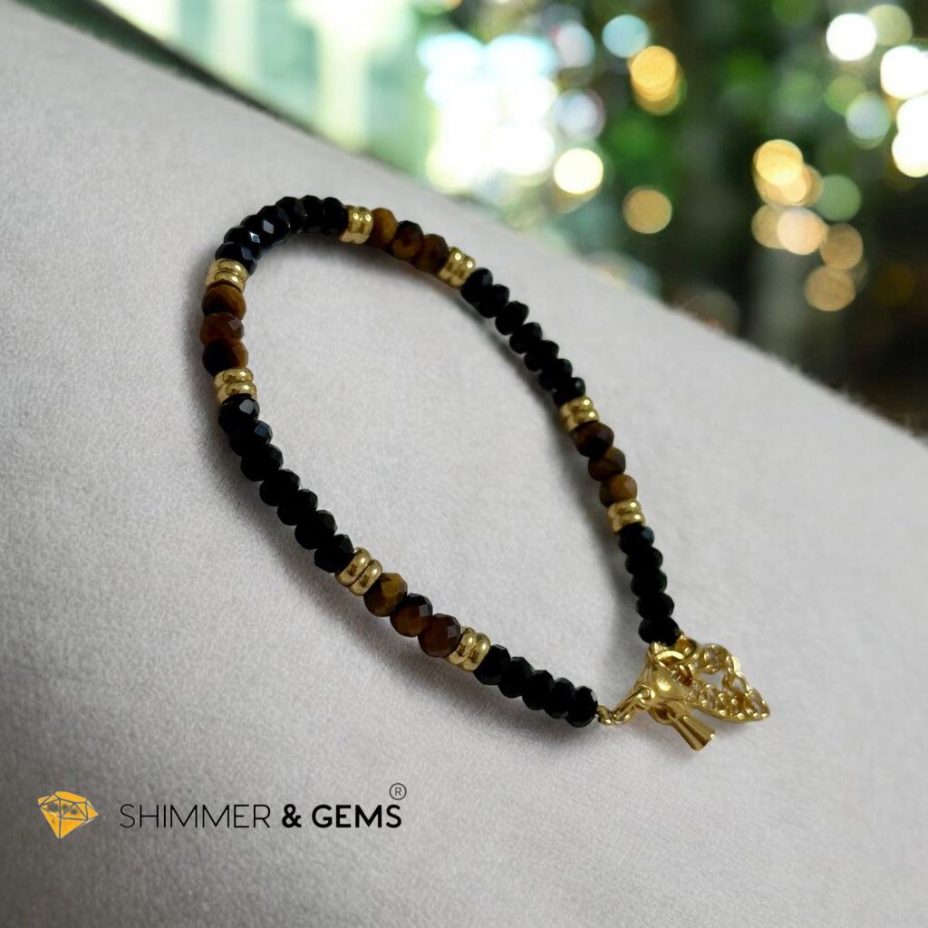 Aura Shield Bracelet
(Onyx & Tiger’s Eye 4mm Rondelle in Stainless Steel Adjustable Chain)