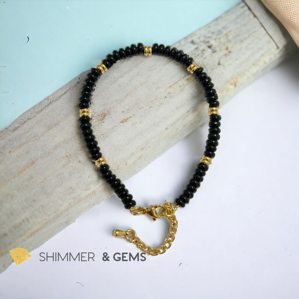 Black Onyx 4mm Rondelle Bracelet with stainless steel chain