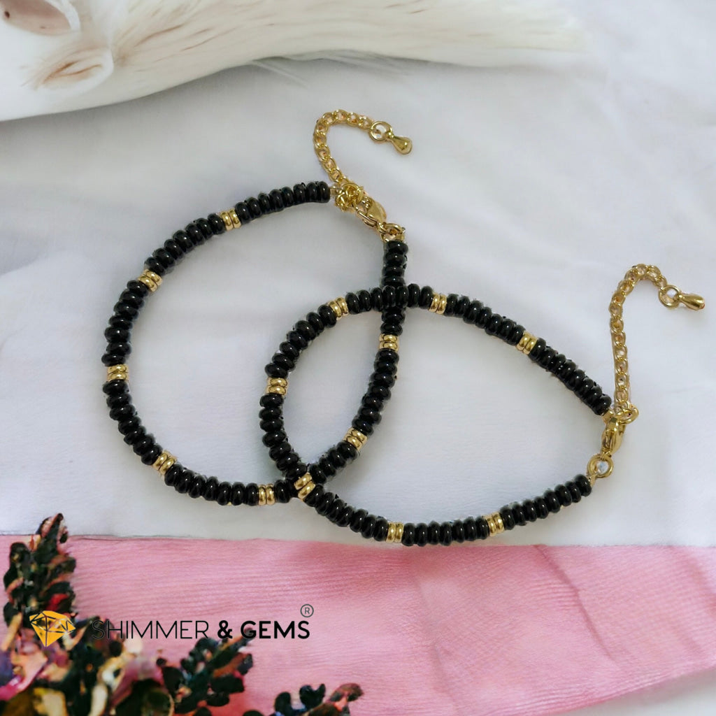 Black Onyx 4mm Rondelle Bracelet with stainless steel chain