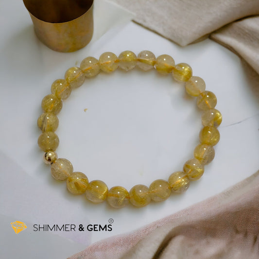 Golden Rutilated 7mm AAAA Grade Bracelet with 14k gold filled Bead