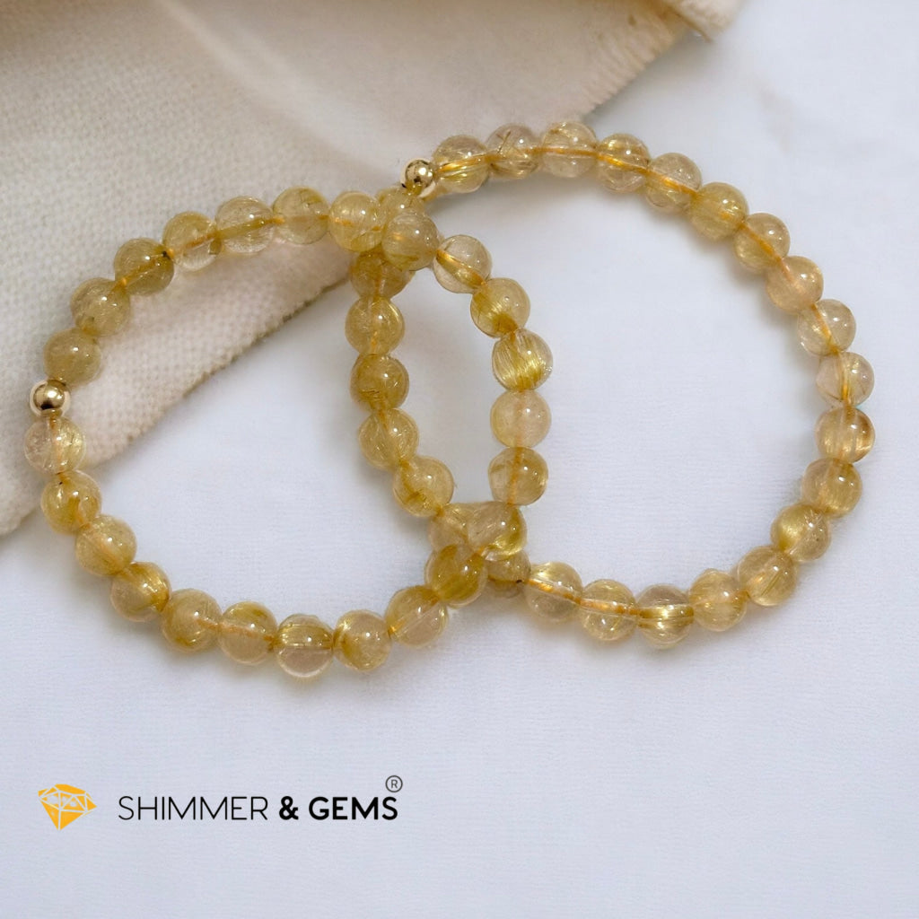 Golden Rutilated 7mm AAAA Grade Bracelet with 14k gold filled Bead