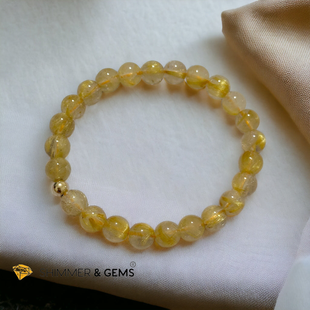 Golden Rutilated 7mm AAAA Grade Bracelet with 14k gold filled Bead