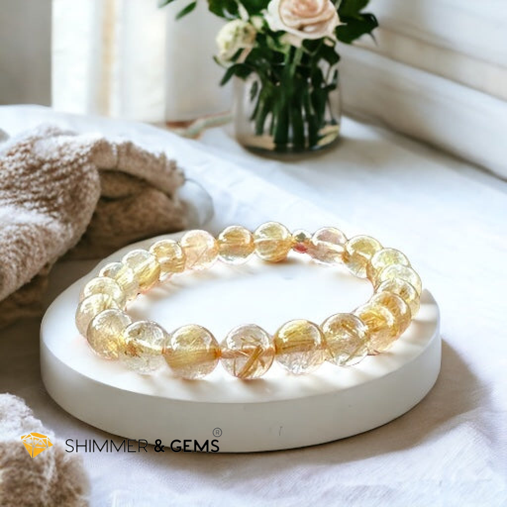 Golden Rutilated 8mm AAAA Grade Bracelet with 14k gold filled Bead