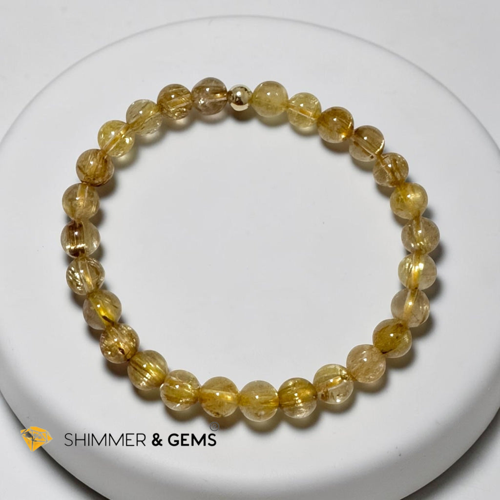 Golden Rutilated Quartz Premium 7mm Bracelet
AAAAA Grade