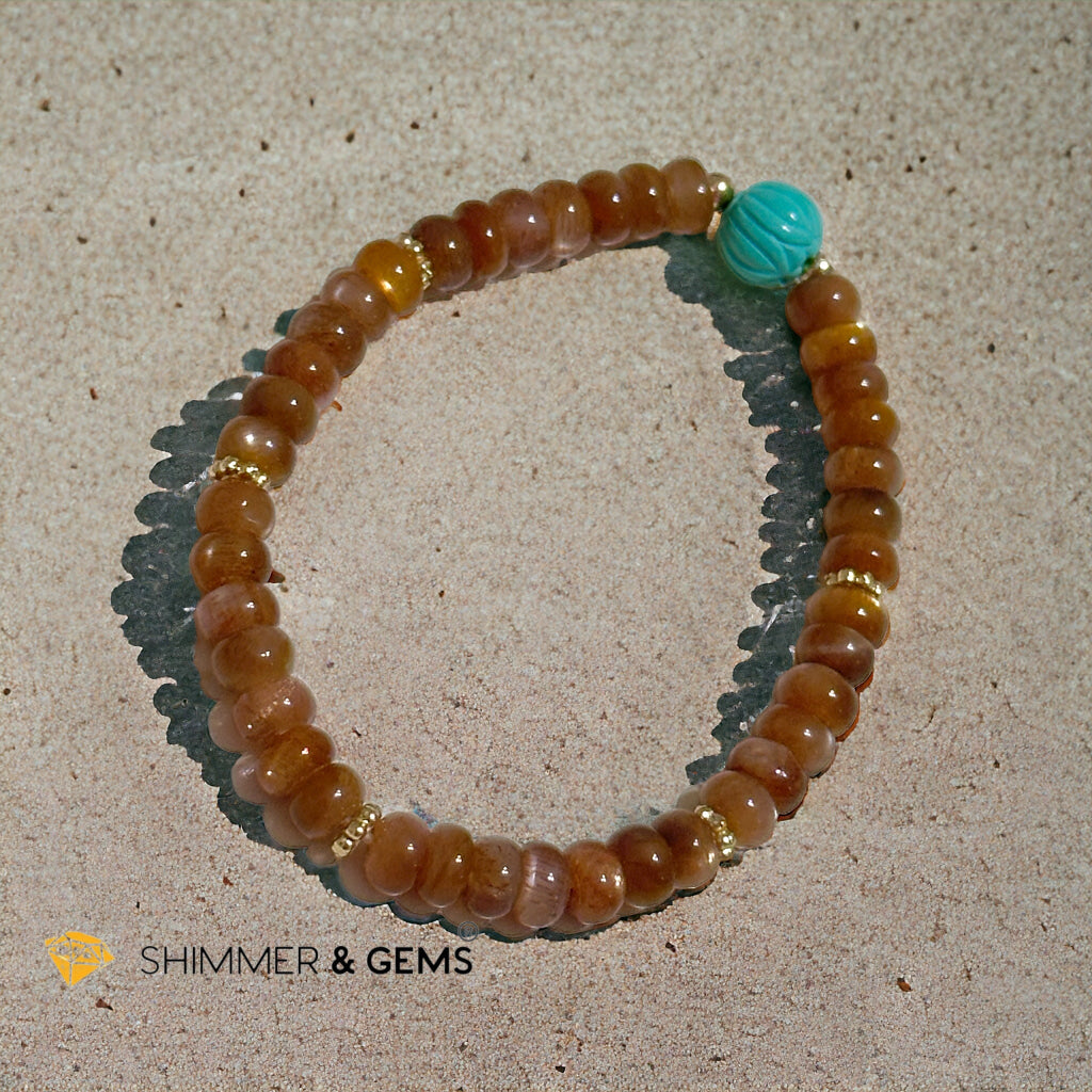 Golden Sunstone Rondelle with Lotus Turquoise Bracelet
