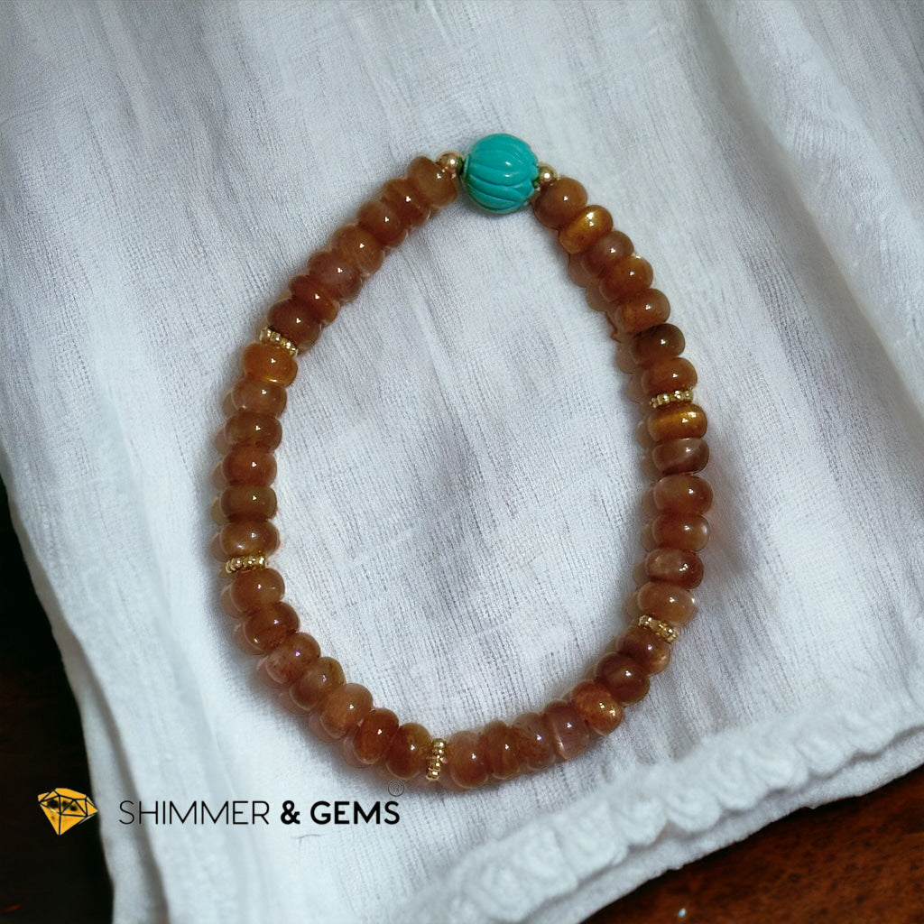 Golden Sunstone Rondelle with Lotus Turquoise Bracelet
