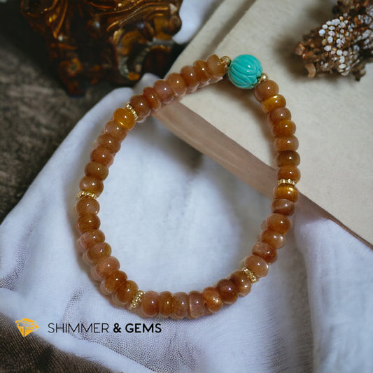 Golden Sunstone Rondelle with Lotus Turquoise Bracelet