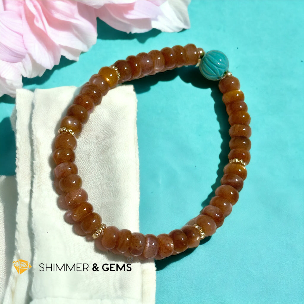Golden Sunstone Rondelle with Lotus Turquoise Bracelet