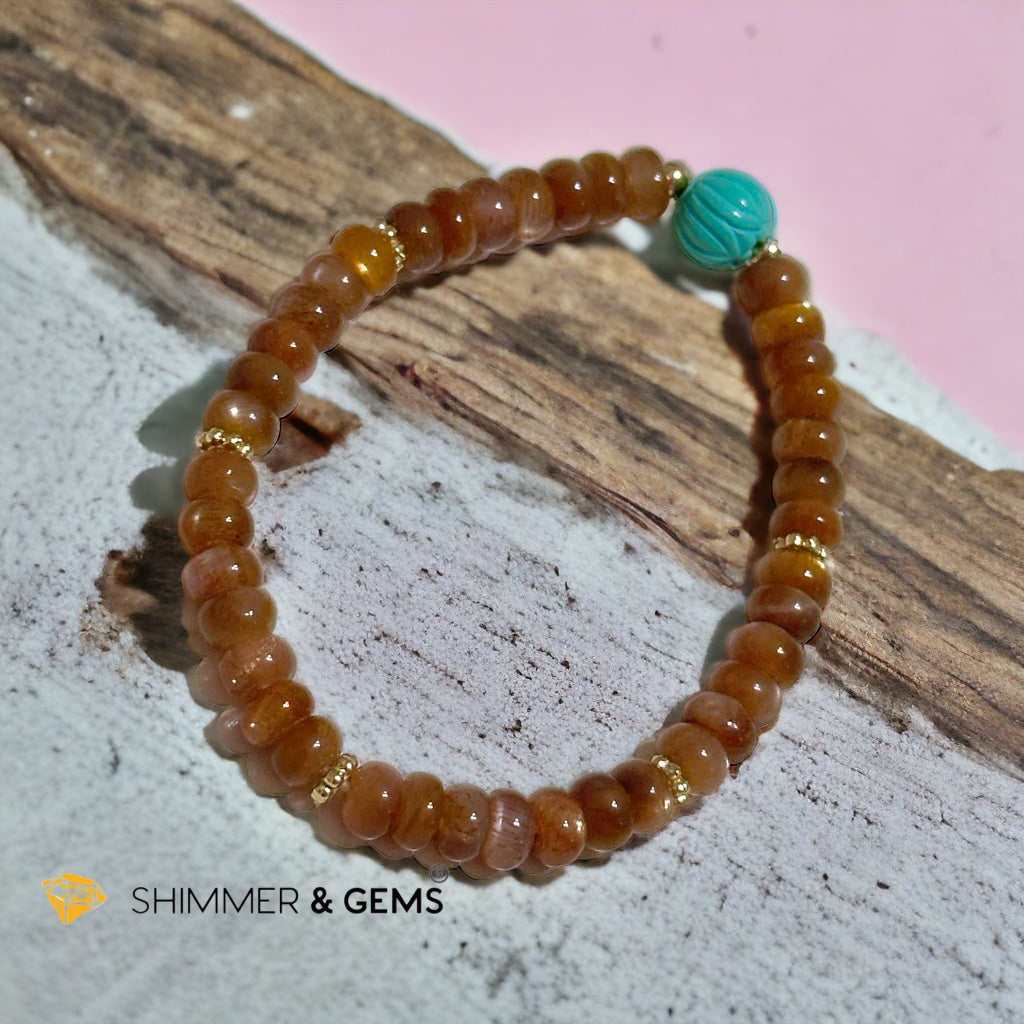 Golden Sunstone Rondelle with Lotus Turquoise Bracelet