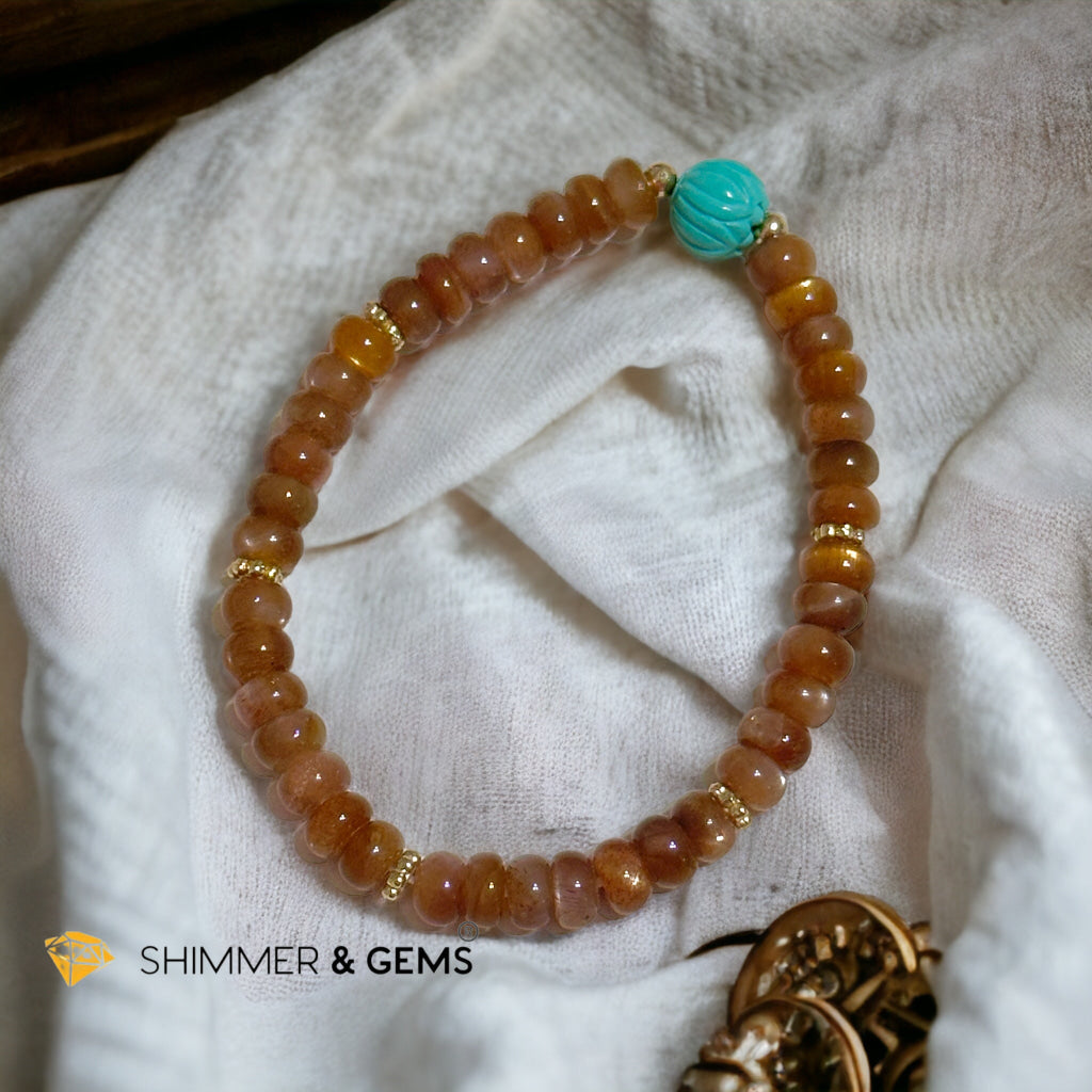 Golden Sunstone Rondelle with Lotus Turquoise Bracelet